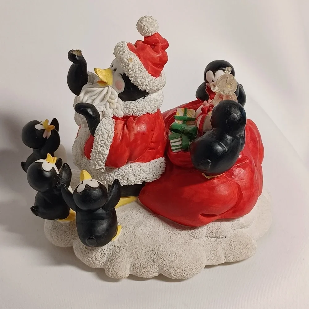 House of Lloyd Penguin Santa Figurine Music Box Plays Let it Snow  Works Great!!
